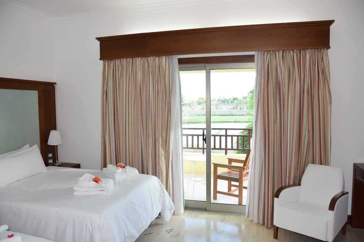 2 habitaciones, edredón, camas Select Comfort y minibar