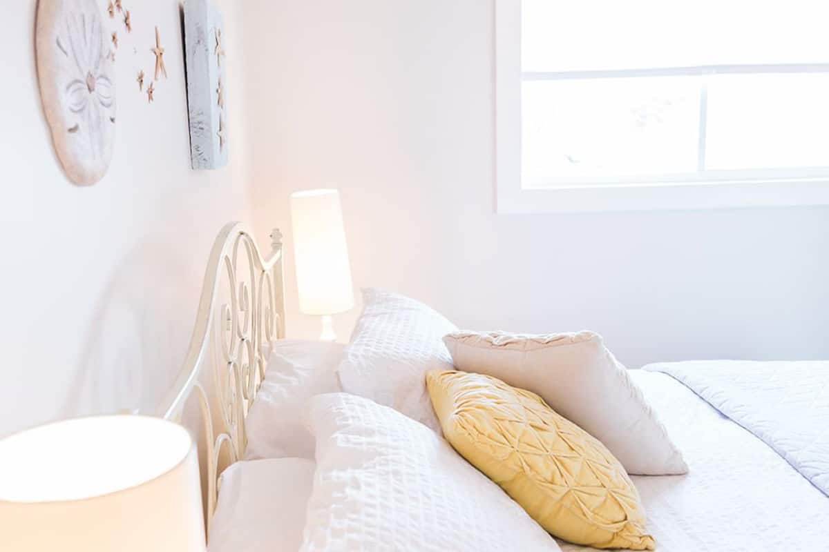 Oyster Cottage | Premium bedding, down comforters, laptop workspace