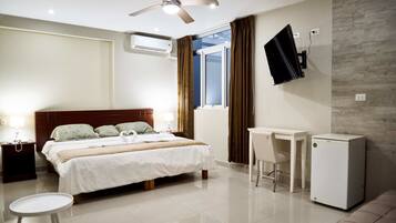 Classic Triple Room, Multiple Beds, City View | In-room safe, desk, blackout curtains, iron/ironing board
