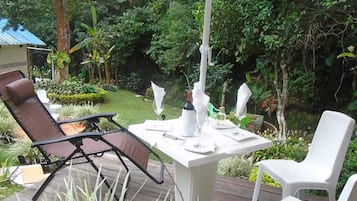 Enjoy a romantic meal amidst lush greenery and serene surroundings.