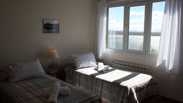 Family Apartment, Multiple Beds, Bay View | Blackout curtains, iron/ironing board, free WiFi, bed sheets