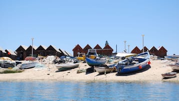 On the beach, beach umbrellas, beach towels