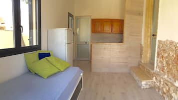 Apartment, 1 Bedroom (Luciana) | Private kitchen | Fridge, stovetop, electric kettle, cookware/dishes/utensils