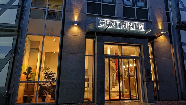 A modern building with a sign reading "CENTRINUM". - CENTRINUM Altstadt-Hotel (Melsungen)