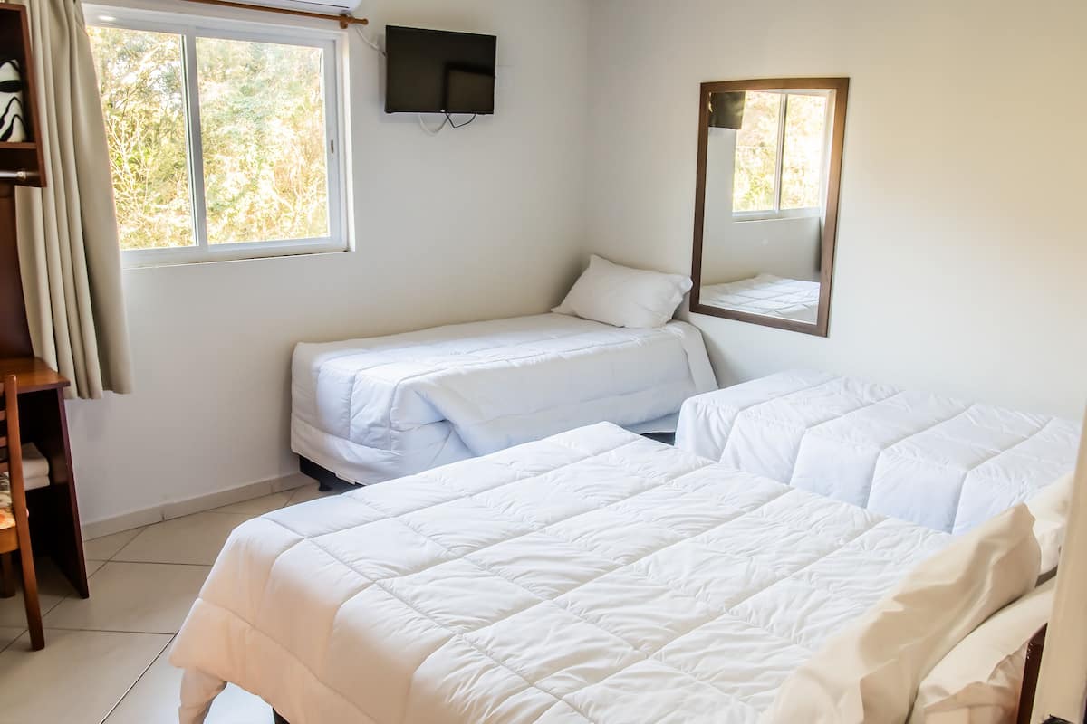 Standard Quadruple Room, Multiple Beds | Blackout drapes, free WiFi, bed sheets