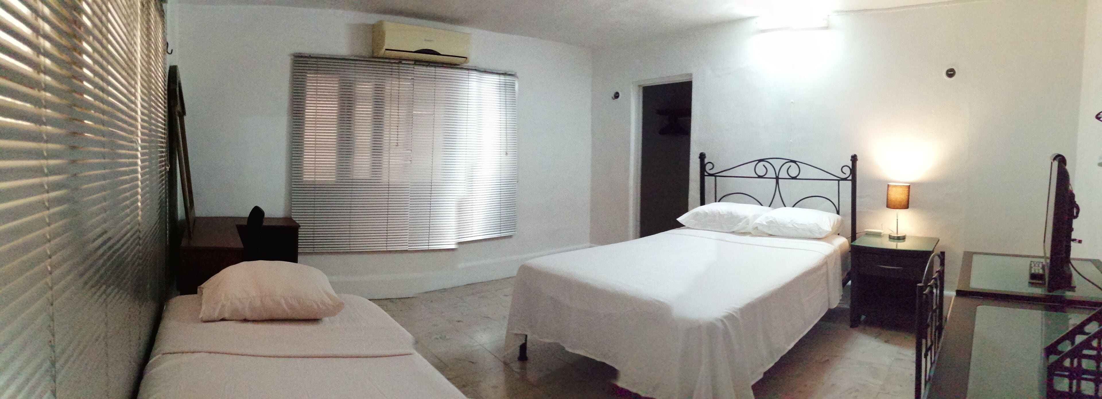 Apartamento família, várias camas, vista para o pátio | Roupas de cama premium, camas com colchões pillow-top