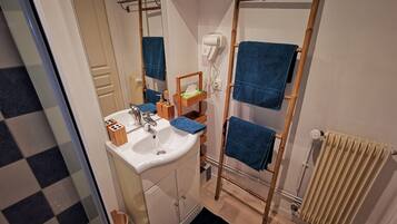 Hair dryer, towels, soap, shampoo