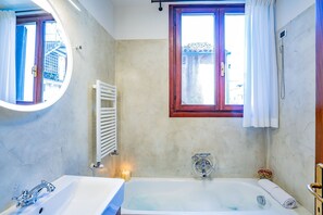 Bathtub, hair dryer