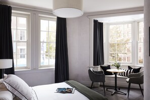 Habitació Deluxe | Minibar, caixa forta a l'habitació i planxa i posts de planxar 