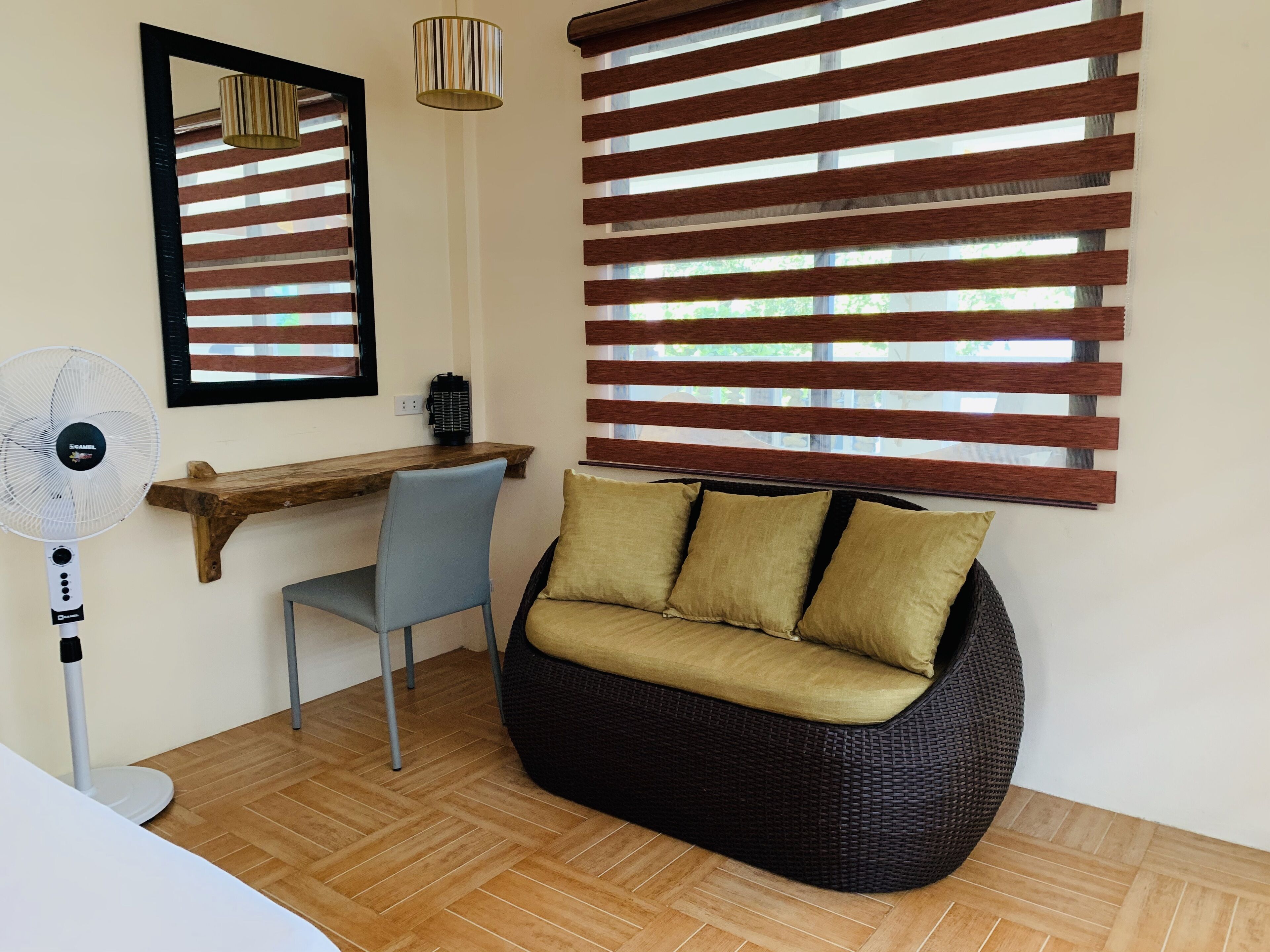 second floor family seaview room for 5 pax | living room | flat-screen tv