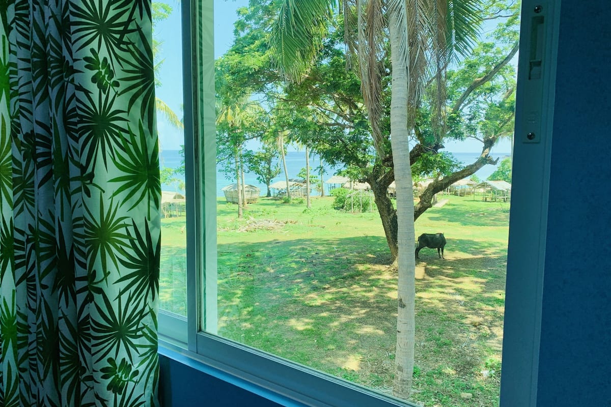 exclusive villa, 3 bedrooms, partial ocean view, mountainside (gigi 10 pax) | view from room