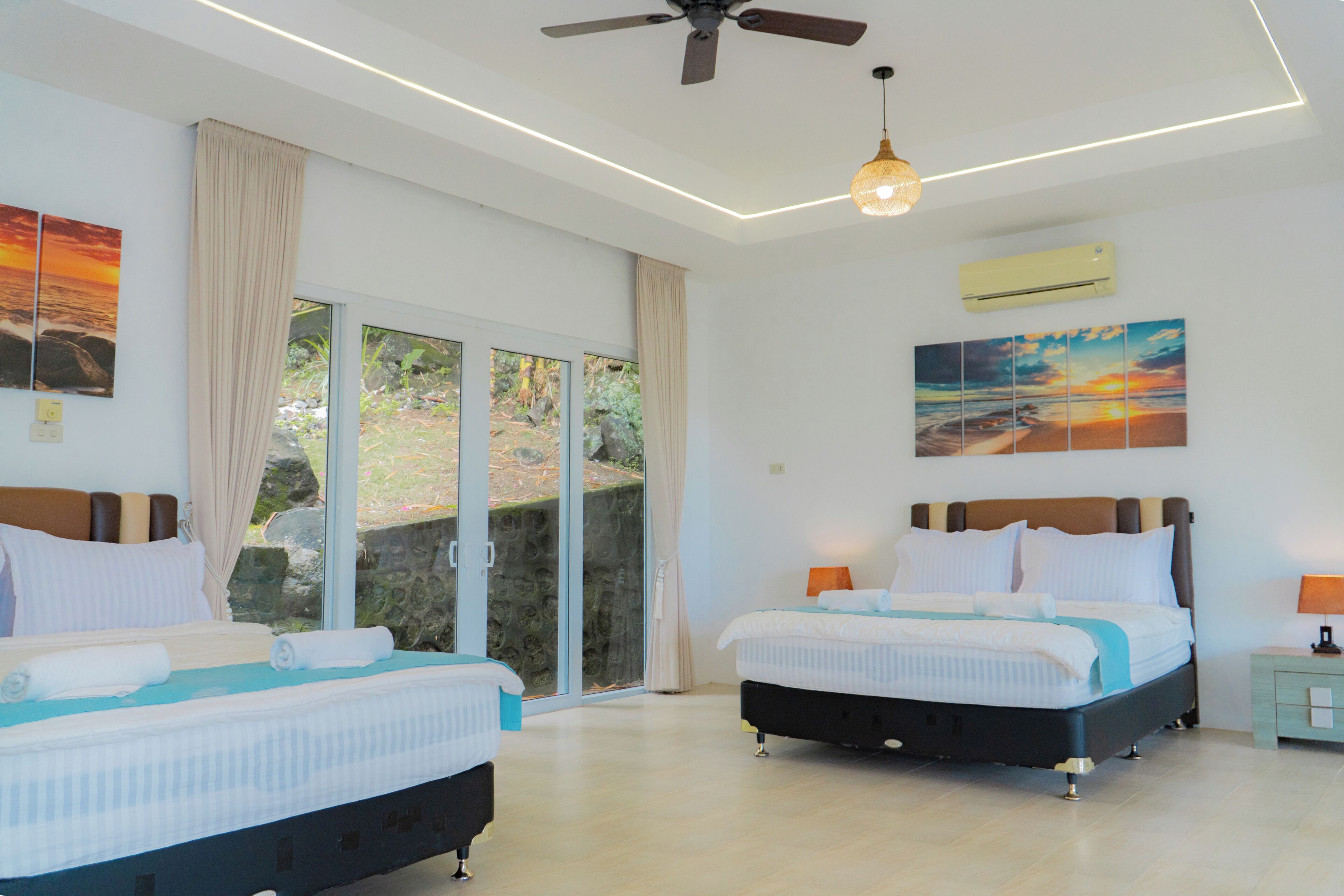 Luksushuvila, useita sänkyjä, tupakointi kielletty, rantanäköala | 1 makuuhuone, tallelokero huoneessa, äänieristys, ilmainen Wi-Fi