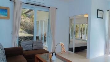 Luxe villa, Meerdere bedden, niet-roken, uitzicht op het strand | Woonruimte