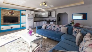 Villa, vue piscine | Salle de séjour