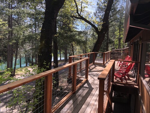 Lakefront house with 1000 sq/ft of decking with unobstructed view of the water.