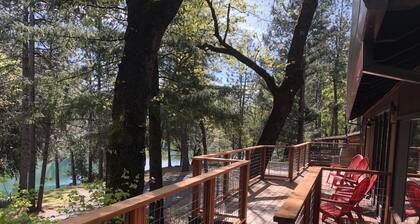 Lakefront house with 1000 sq/ft of decking with unobstructed view of the water.