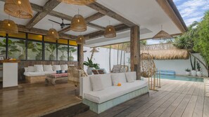 Family Villa, 4 Bedrooms | Living area | Flat-screen TV - Villa Metisse by Villa Finder (Seminyak)