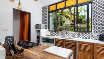 Family Villa, 4 Bedrooms | Private kitchenette | Fridge, microwave, stovetop, coffee/tea maker