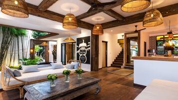 Family Villa, 4 Bedrooms | Living room | Flat-screen TV