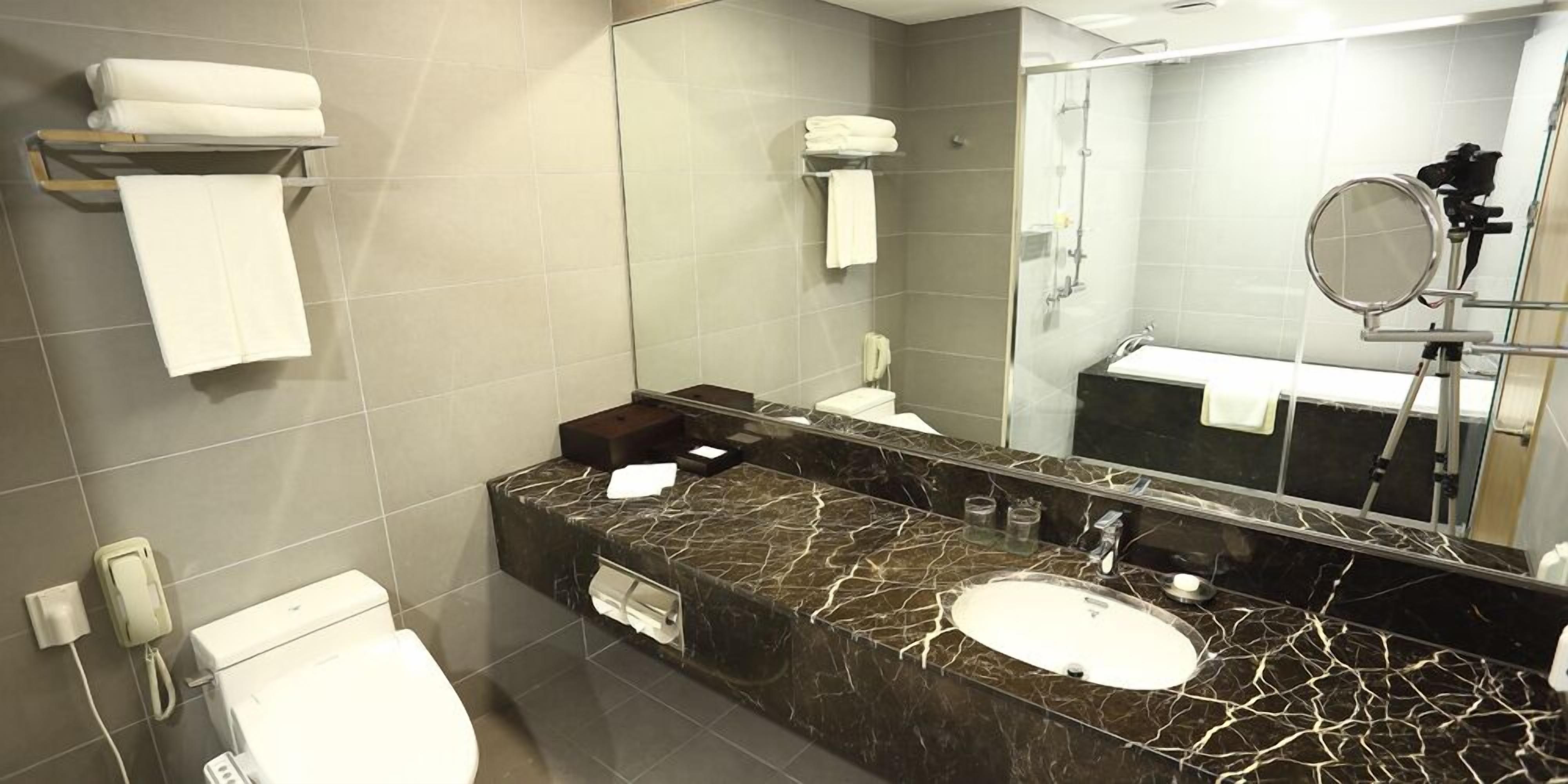 free toiletries, hair dryer, slippers, bidet