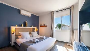 4 chambres, coffres-forts dans les chambres, fer et planche Ă repasser