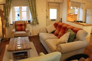 Een televisie, een open haard, slimme speakers en streamingdiensten