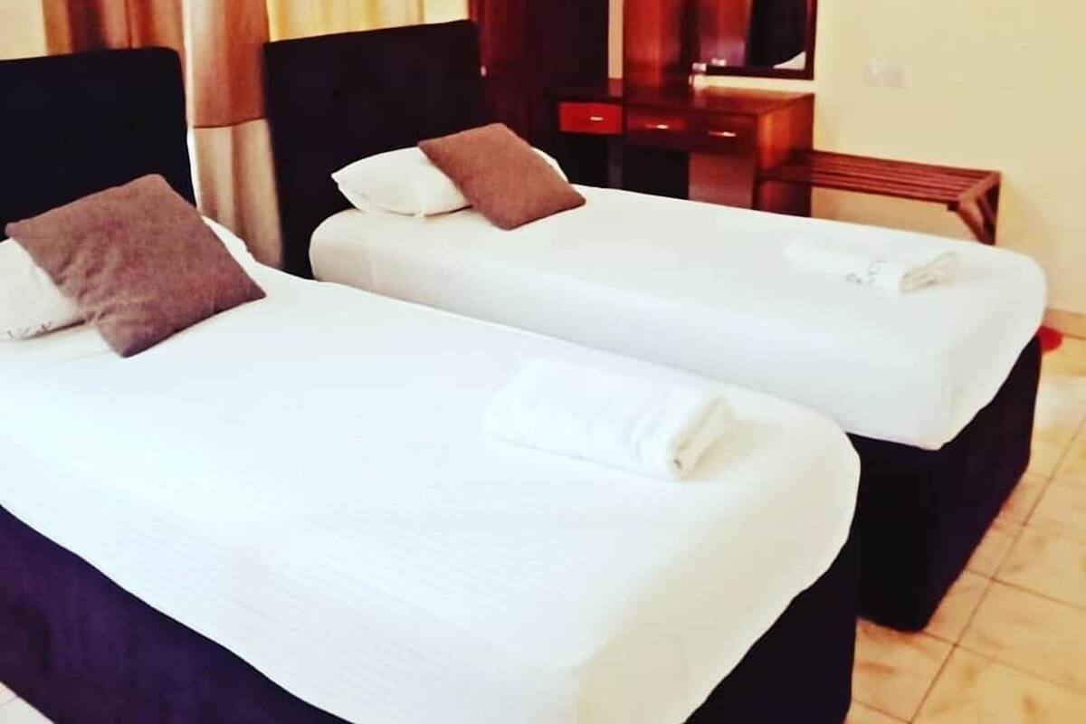 Twin Room | Iron/ironing board (on request), WiFi (free), bed sheets