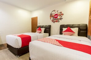 Standard Twin Room, 2 Single Beds | Free WiFi - OYO 619 Naufal Guest House Syariah (Medan)