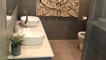 Hair dryer, towels, soap, shampoo