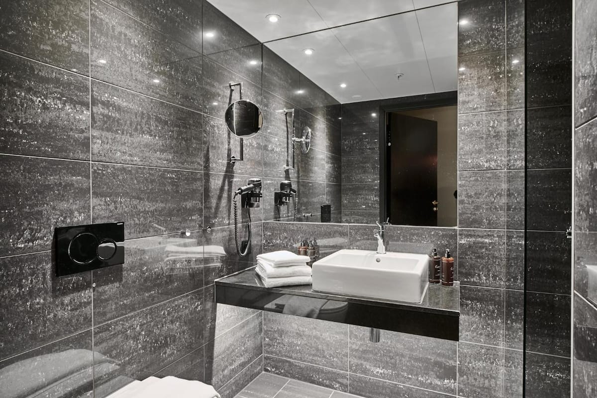 superior room, 1 king bed | bathroom | shower, hair dryer, bathrobes, slippers