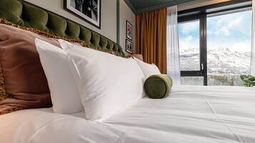 Minibar, blackout curtains, iron/ironing board, rollaway beds