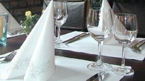 A table set with wine glasses, cutlery, and a napkin. - Hotel Lederfabrik (Muelheim an der Ruhr)