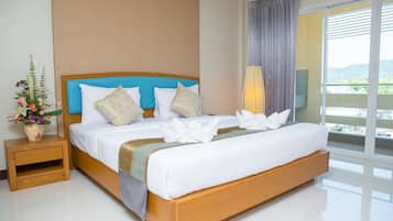 Standard Room, 1 Queen Bed, Balcony | Desk, free WiFi