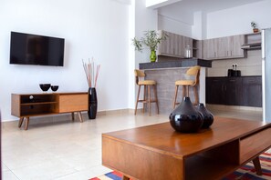 Family Duplex, Multiple Beds, City View | Private kitchen | Full-size fridge, microwave, stovetop, coffee/tea maker - L'Aziz Suites (Nairobi)