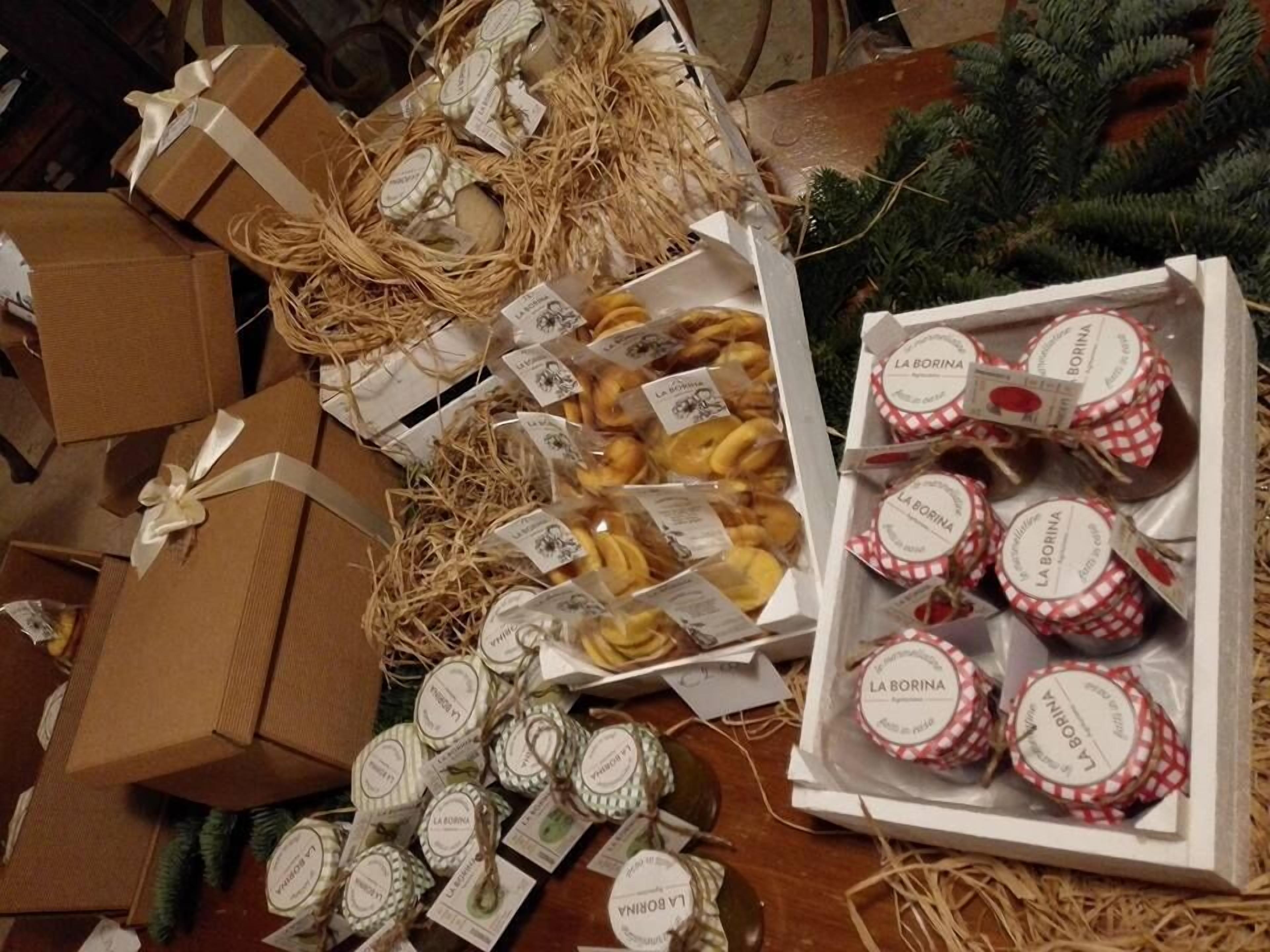 A variety of packaged goods, including jars and boxes, arranged on a table.