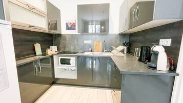 Fridge, microwave, coffee/tea maker, freezer