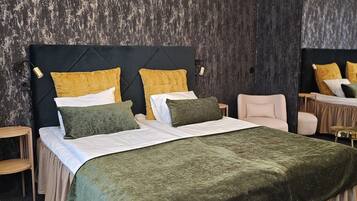 Habitación Deluxe | Escritorio, cortinas blackout y insonorización