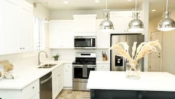 Coffee/tea maker, fridge, microwave, oven