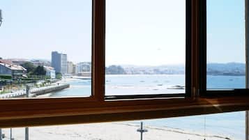Tweepersoonskamer | Uitzicht op strand/zee