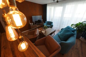 Minibar, coffres-forts dans les chambres, bureau, rideaux occultants