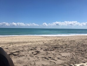 On the beach, sun-loungers, beach towels