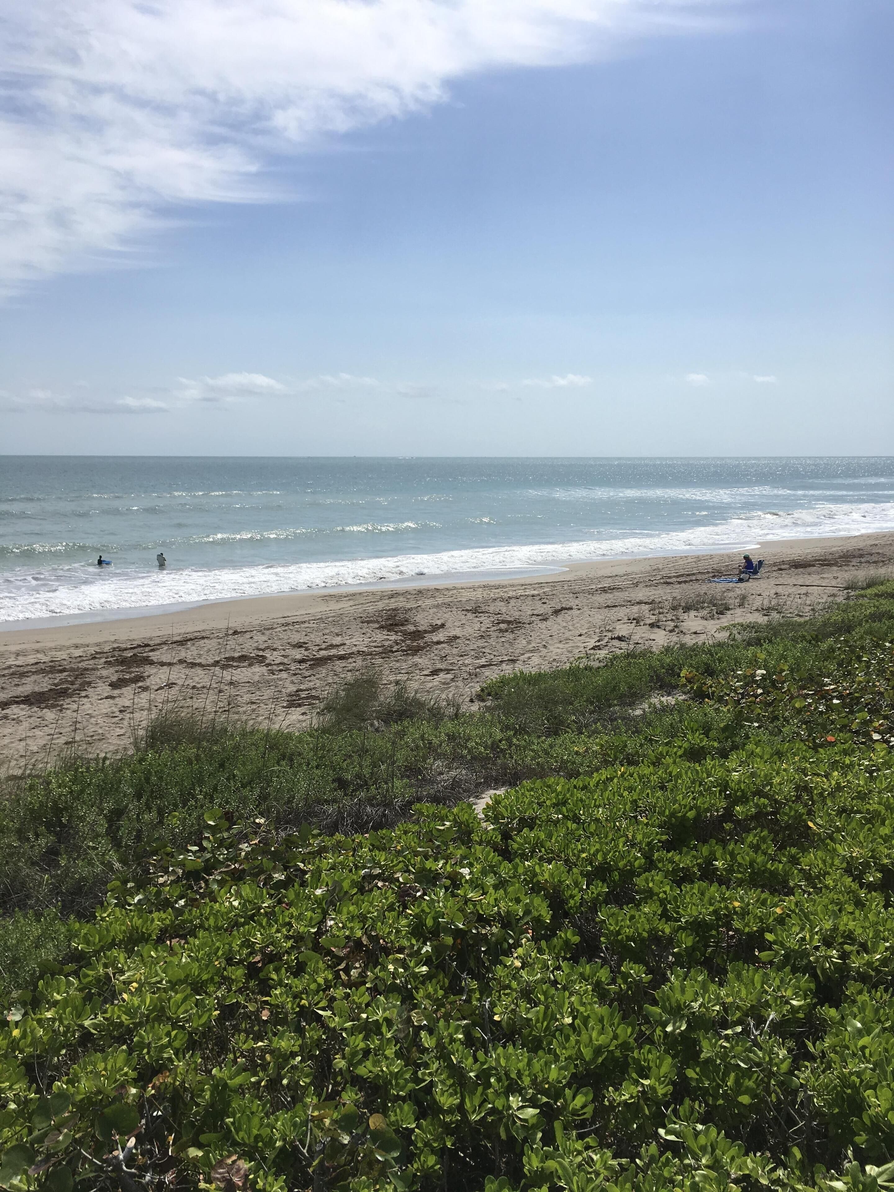 On the beach, sun loungers, beach towels