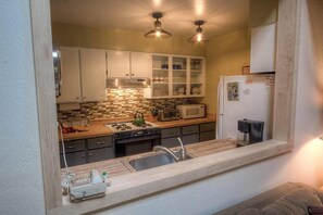 Condo, Multiple Beds, Fireplace, Pool View | Private kitchen | Fridge, microwave, stovetop, dishwasher - Alpine Getaway (Tahoe City)