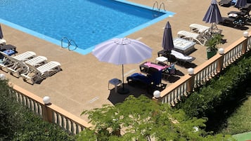 Outdoor pool, pool umbrellas, pool loungers