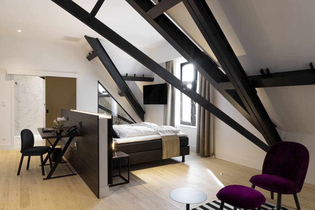 suite | free minibar items, in-room safe, desk, blackout curtains