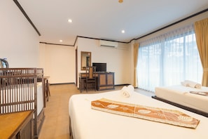 Family Suite, Multiple Beds, Balcony | Minibar, in-room safe, desk, laptop workspace - Seeka Boutique Resort (Patong)