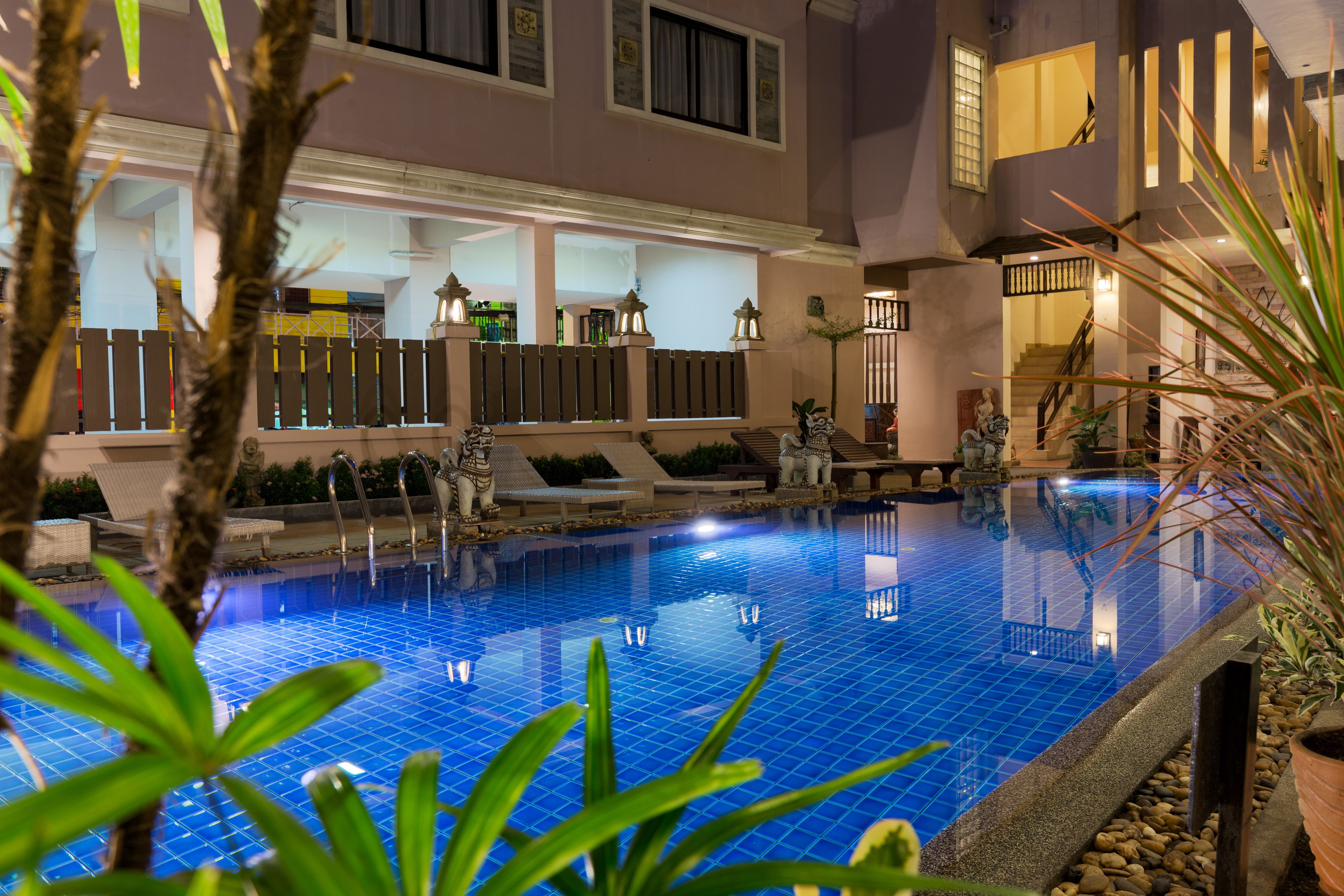 Outdoor pool, open 9:00 AM to 8:00 PM, pool loungers