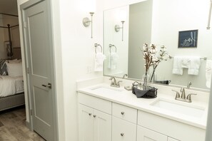 Bathtub, hair dryer, towels