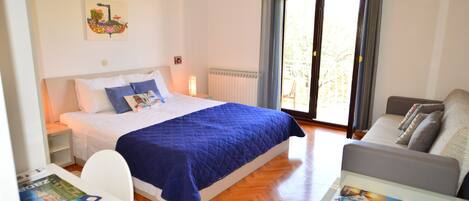 Pistacio | Desk, blackout drapes, soundproofing, iron/ironing board