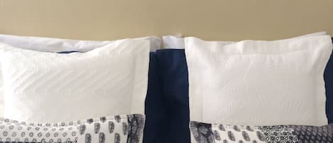 Egyptian cotton sheets, premium bedding, down duvets, pillow-top beds